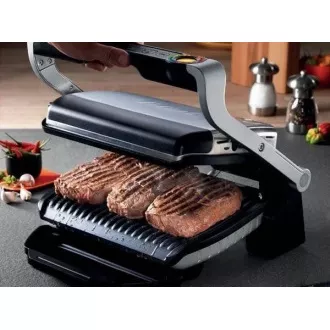 Grill elektryczny Tefal GC712D34 OptiGrill Inox, 2000 W, 6 programów, termostat, tacka na sok, srebrny/czarny Grill elektryczny Tefal GC712D34 OptiGrill Inox, 2000 W, 6 programów, termostat, tacka na sok, srebrny/czarny