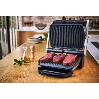 Grill kontaktowy Tefal Optigrill GC712834, 2000 W, 6 programów, wskaźnik postępu, tacka ociekowa, czarny Grill kontaktowy Tefal Optigrill GC712834, 2000 W, 6 programów, wskaźnik postępu, tacka ociekowa, czarny